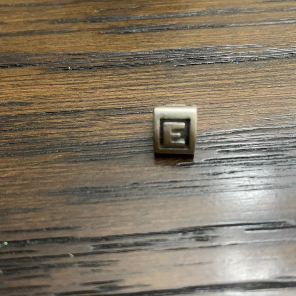 Beautiful retired letter charm